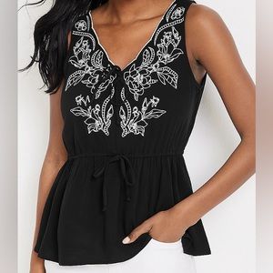Peplum embroidered top